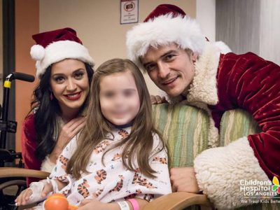 Katy Perry y Orlando Bloom juntos y solidarios vestidos de Papá Noel